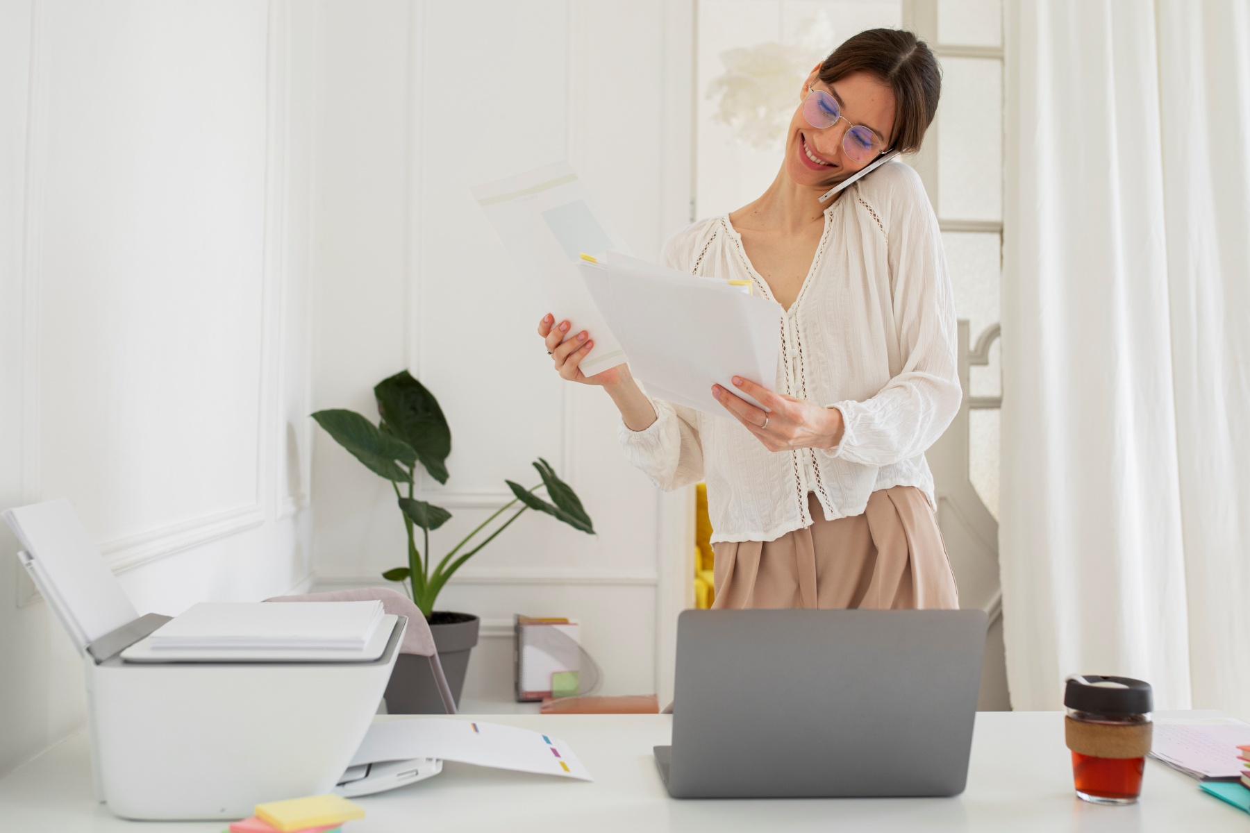 front-view-smiley-woman-talking-phone.jpg