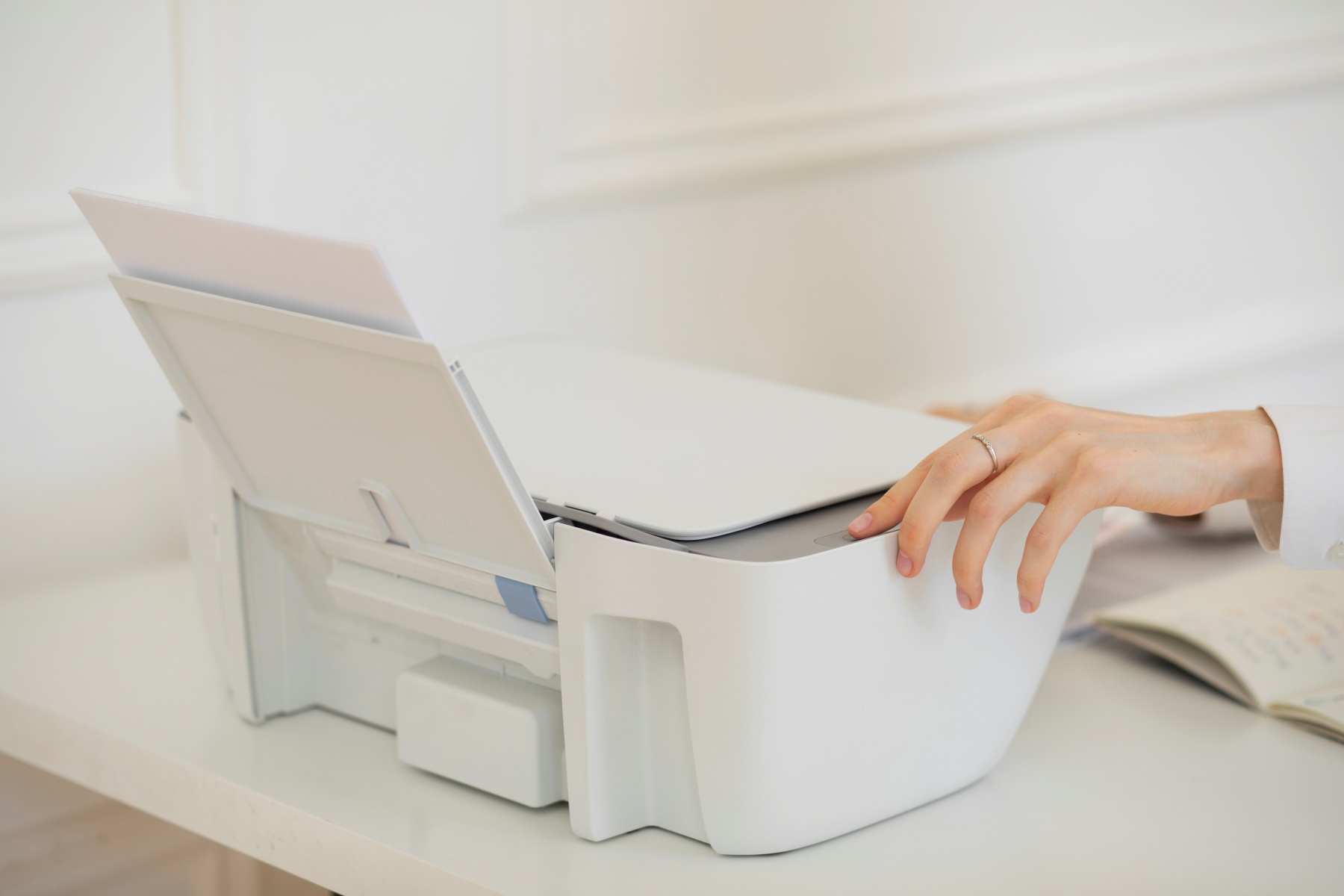 side-view-hand-using-printer-work.jpg